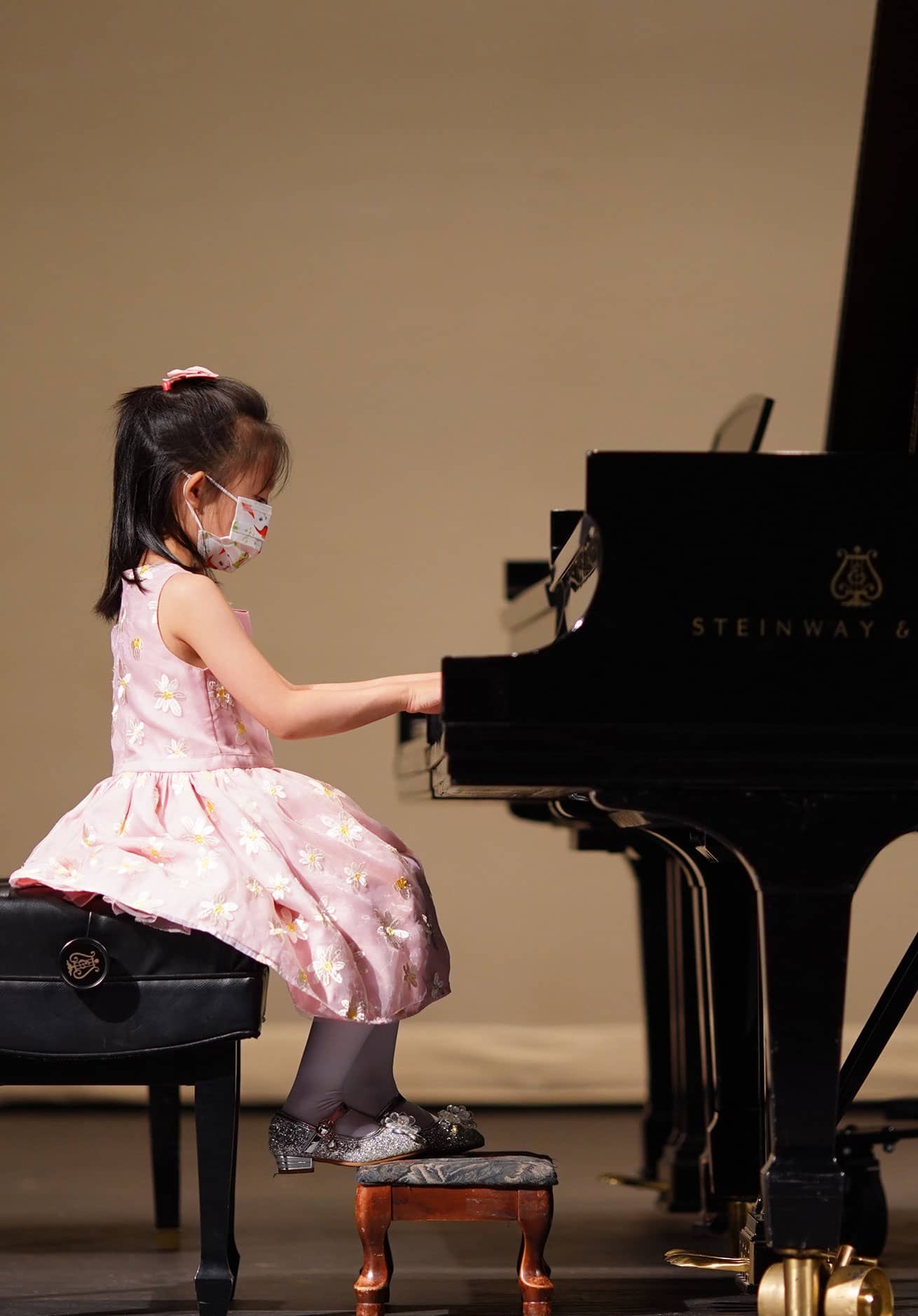 child playing piano